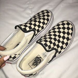 Checkerboard slip on vans